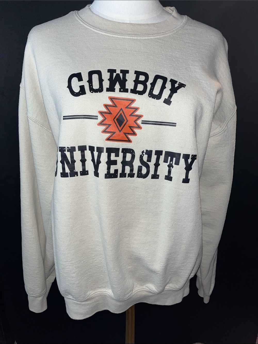 Gildan Cream Crewneck Sweatshirt with Black Text and Orange Emblem